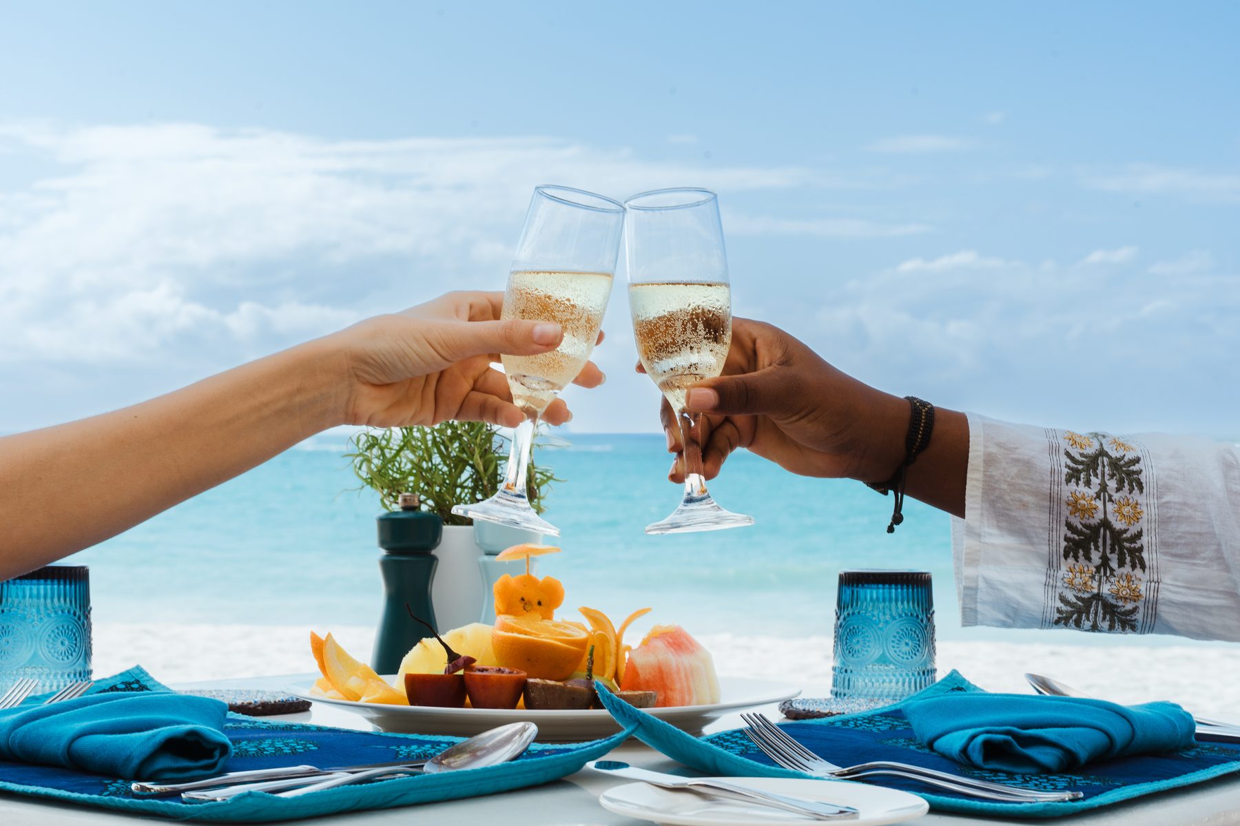A toast over a beachside table at Soroi Blue, Diani